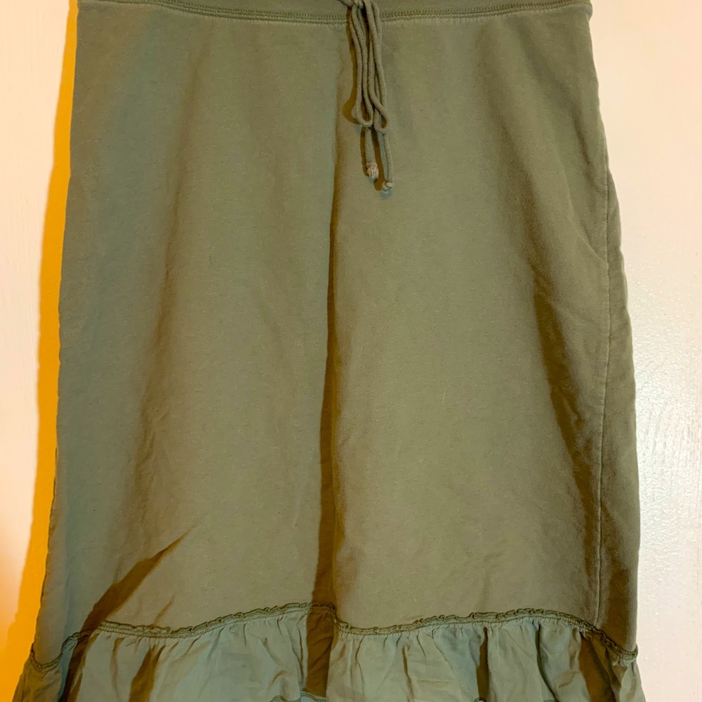 Olive green medium sized Skirt with ruffles the bottom